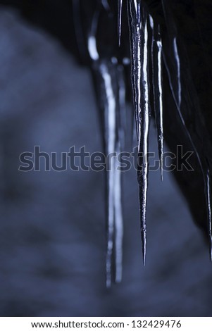 Icicles hanging down from rocks