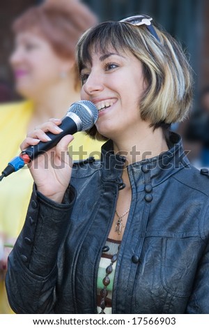 young woman-speaker