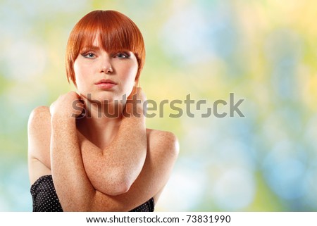 summer teen girl beautiful freckles redheaded over green nature background