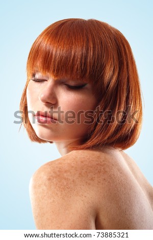 woman beautiful young make-up isolated on blue background