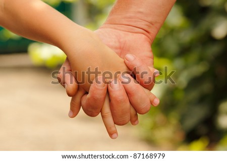 family father and child son hands nature outdoor