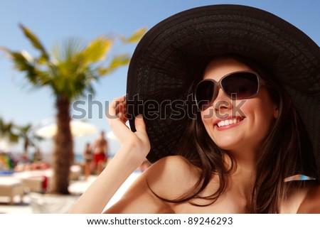 stock photo summer beach teen girl cheerful in panama and sunglasses 