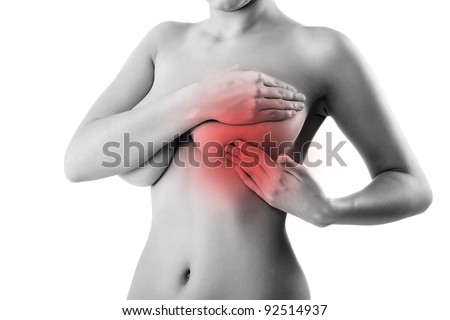 woman examining breast mastopathy or cancer