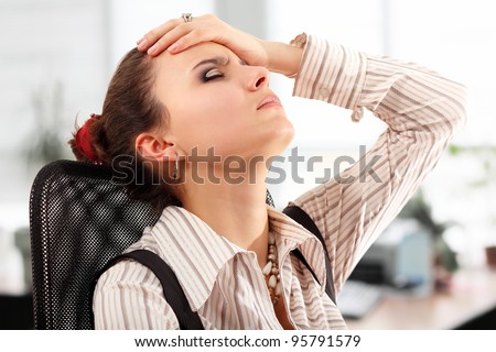 business woman tired depressed in office