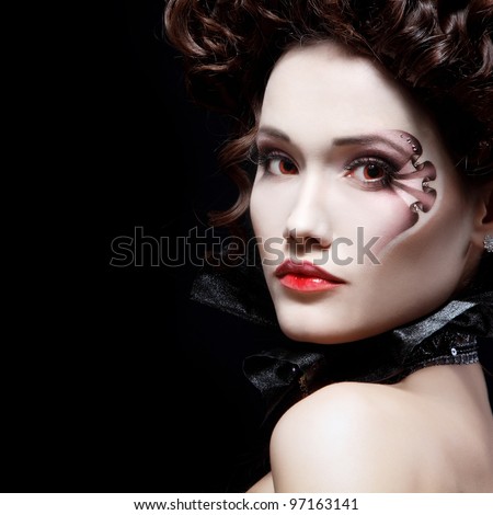 portrait of beautiful halloween woman vampire baroque aristocrat over black background