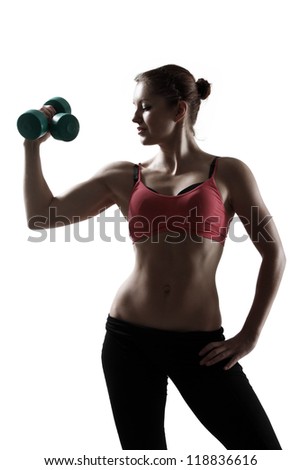 sport woman doing exercise with dumbbells, silhouette studio shot over white background