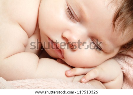 cute sleeping baby, beautiful kid\'s face closeup, studio shot