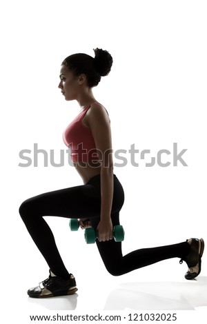 sport young athletic woman doing lunge with dumbbells, fitness girl silhouette studio shot over white background