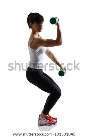 sport girl doing with exercise dumbbells, fitness woman studio shot in silhouette technique over white background