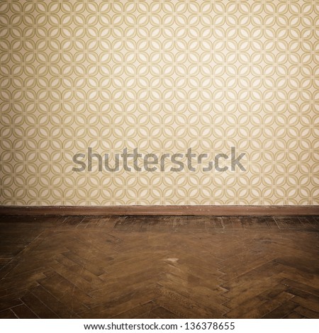 Vintage room empty retro apartment with old fashioned wallpaper and weathered wooden parquet floor toned Vintage room empty retro apartment with old fashioned wallpaper and weathered wooden parquet floor toned