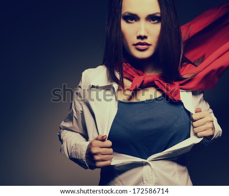 Young Pretty Woman Opening Her Shirt Like A Superhero. Super Girl, Image Toned. Beauty Saves The World.