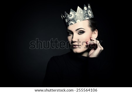 Glamour portrait of beautiful woman model with fresh daily makeup and crown. Fashion female portrait, image toned.