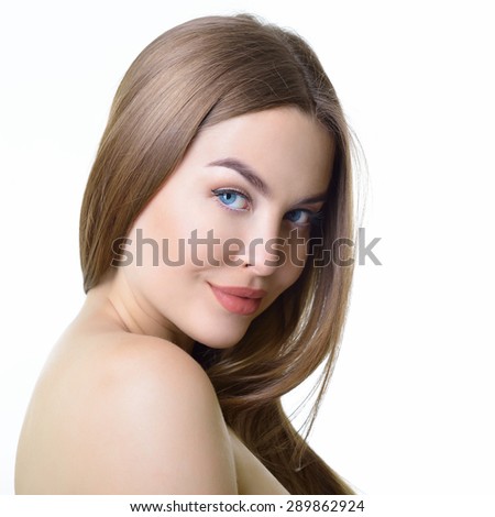 Young woman with beautiful healthy face and long fair hair. Health care, skin care, beauty treatment, cosmetology, youth and aging concept.