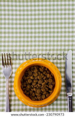 Bowl full of dog food. Banner, background for menu. vertical composition