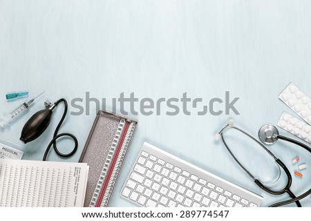 top view of medical equipment on a blue desk