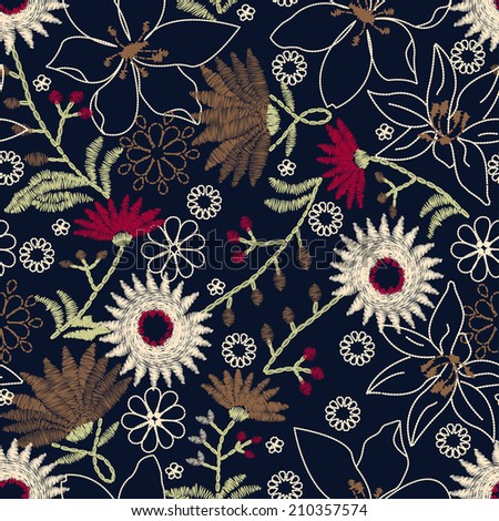 Tropical embroidery floral design in a seamless pattern .