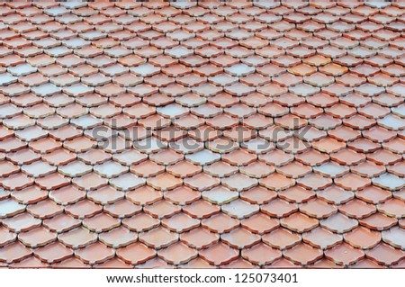 Tile roof of old temple in Thailand.