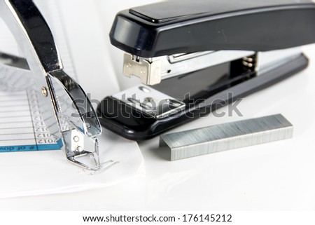 stapler and staple remover  on white background