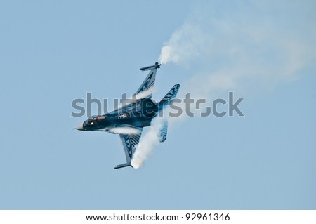 RADOM, POLAND - AUGUST 27: Belgian Air Force F-16 makes its show during Air Show Radom on August 27, 2011