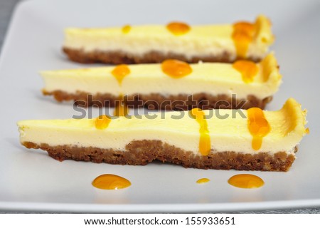 Cheesecake with mango juice