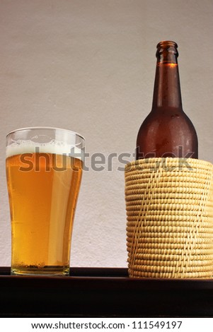 beer bottle in a wicker container
