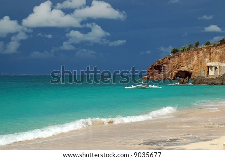 View of Scenic Tropical Beach in Caribbean with Storm Clouds Approaching