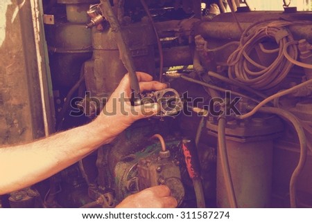 Check out of broken car engine retro
