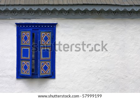 Traditional blue painted windows, old style, country-side.