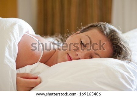 Early in the morning a beautiful girl sleeps