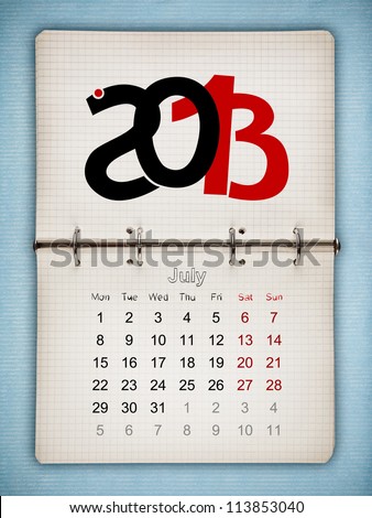 July 2013 Calendar, open old notepad on blue paper