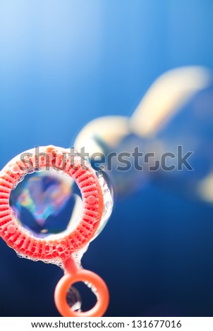 Blowing bubbles, close up photo