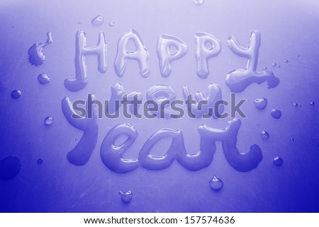 Happy new year concept, water on ice, greeting card