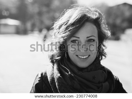 Portrait of a modern young woman,  urban background