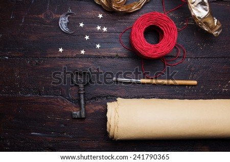 Decoration elements for craft on old wooden table. Decorator workplace.Holiday background