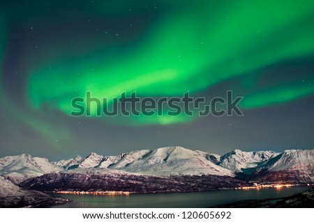 Aurora above fjords in Norway
