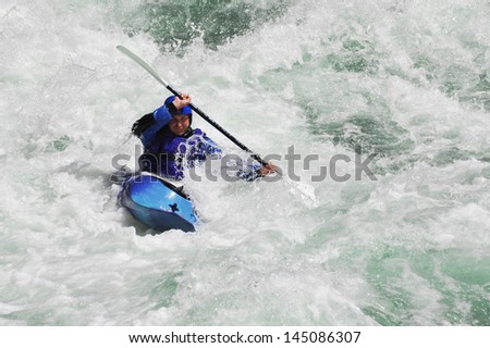 Kayaking as extreme and fun sport.