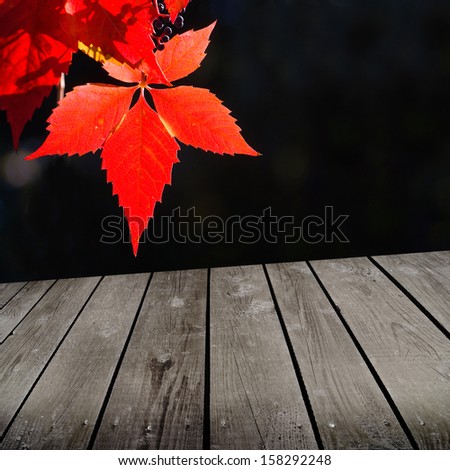 autumn theme and empty wooden deck table. Ready for product montage display