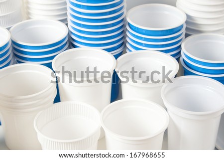 Empty white and blue food glasses background