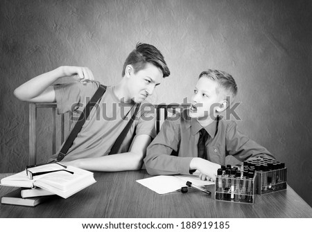Boys conflict . Experiences with test tubes