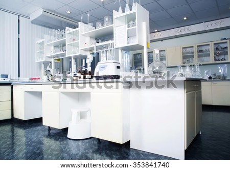 Interior of clean modern white medical or chemical laboratory background. Laboratory concept without people. Horizontal template for a poster, webpage or leaflet.