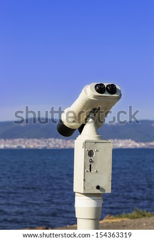 telescope the city, the sea, the mountains, the background
