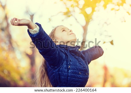 young girl freedom autumn park