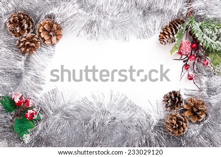 tinsel frame background pine cone bow