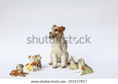 Decorative porcelain dogs isolated on white