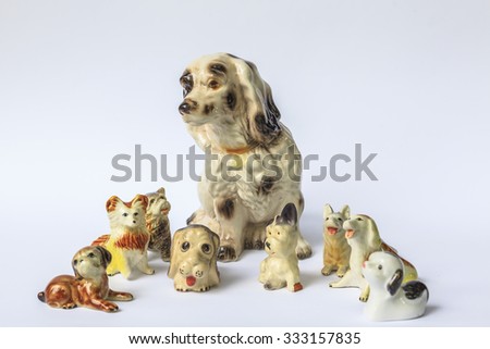 Decorative porcelain dogs isolated on white