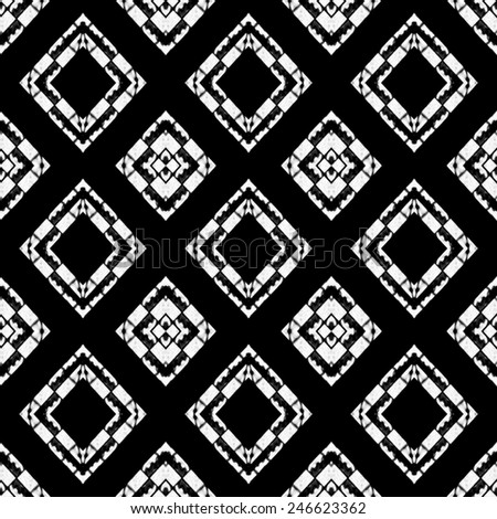 Black and white tones tribal or ethnic background pattern with geometric and abstract symbols motif in hard contrast.