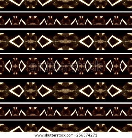 Dark tones tribal style abstract  background with geometric shapes motif pattern in brown and black and white colors.