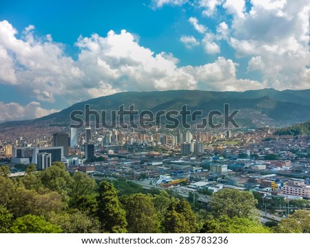 Aerial view of buildings and mountains from Nutibara hill in Medellin, one of the most important cities of Colombia, in South America