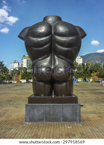 Back view of botero sculpture in a square in Medellin, one of the most important cities of Colombia.