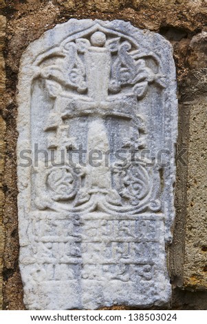 Cross relief on facade of  Armenian Church of St. Sergius in Feodosia, Crimea, Ukraine